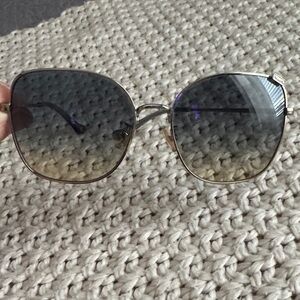 Coach Gold Metal Frame Sunglasses with Gradient blue Lenses